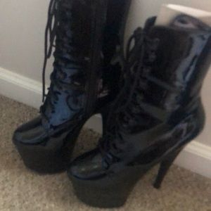 Brand new, never worn black platform Pleaser boots